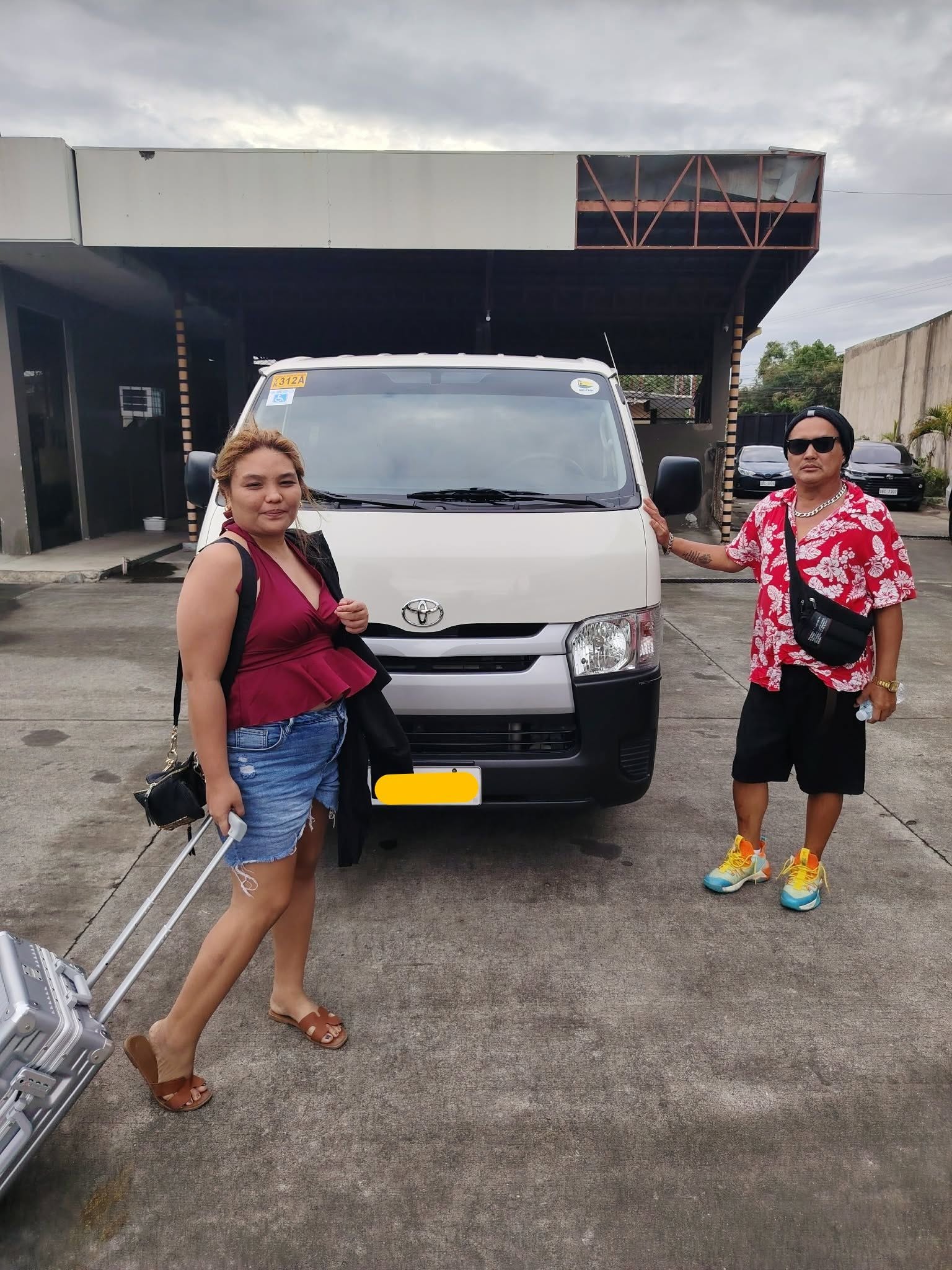 Customer with Toyota Hiace Commuter rental
